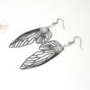 Boucles d'oreilles ailes de fée noir et blanc fines estampes perles par Odacassie